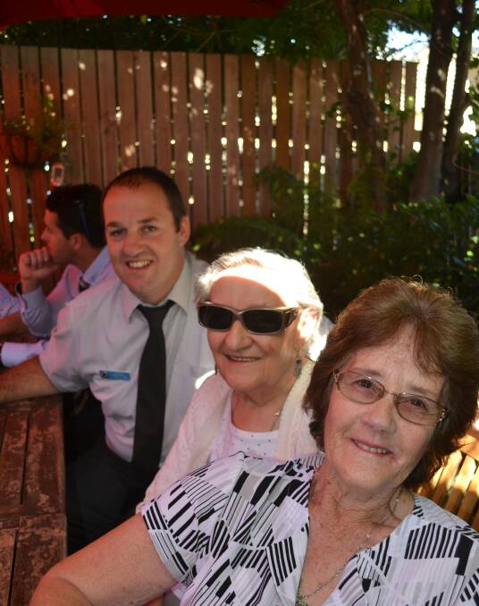 MORNING TEA: Detective Senior Constable Justin Williams with Lina Garegnani and Judy Richards at the event.