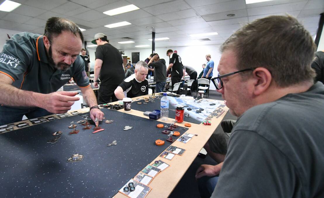 GAMERS: Bathurst contestants from left, Craig Heterick and Dave Sovesky at the Star Wars X Wing Australian National Grand Championships.