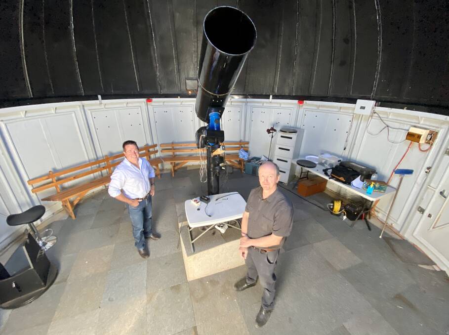 NIGHT VISION: Member for Bathurst Paul Toole, left, with Ray Pickard at the Bathurst Observatory. The observatory has received a one-off grant of $15,000.