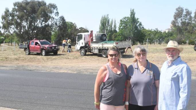 NOT HAPPY: Rocket Street residents Sonia Scott, Nicole Artery and Paul Phinn stand across the road from the dog park. Photo: JACINTA CARROLL