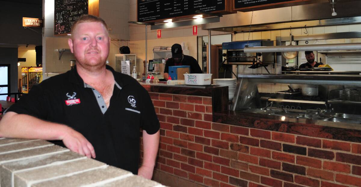 WELCOME NEWS: Dudley Hotel assistant manager Tim Heffernan in the hotel's bistro which, along with cafes, stands to benefit from the $25 vouchers.