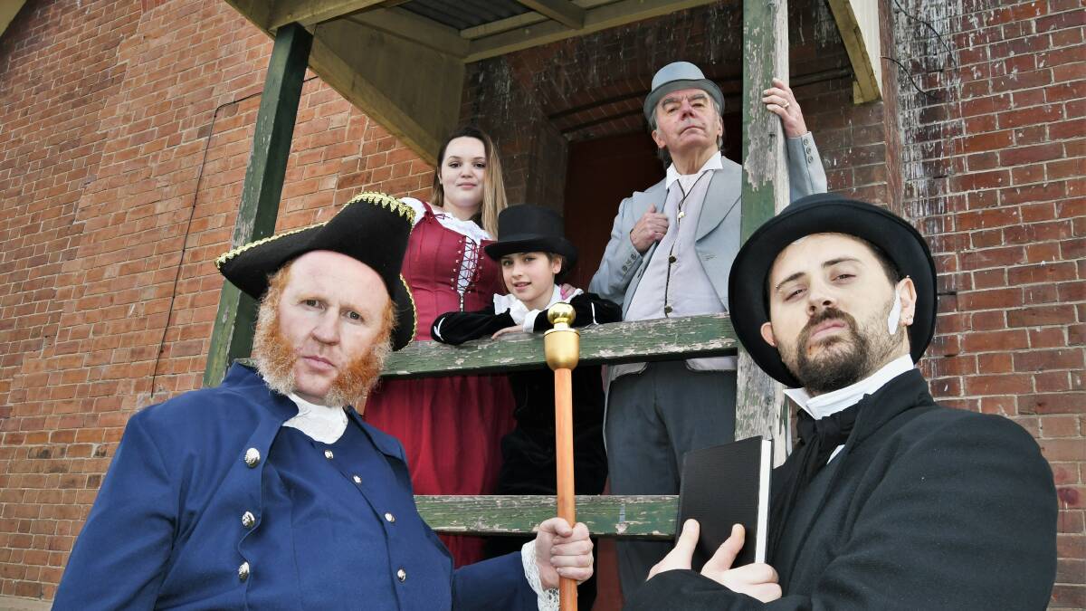 Patrick Sinclair (Mr Bumble), Emily Hayes (Nancy), Emma Lindsay (Oliver), Phil Sanders (Mr Brownlow) and Alex Woodhouse (Mr Sowerberry) are part of the cast of Carillon Theatrical Society's production of Oliver!. Photo: CHRIS SEABROOK