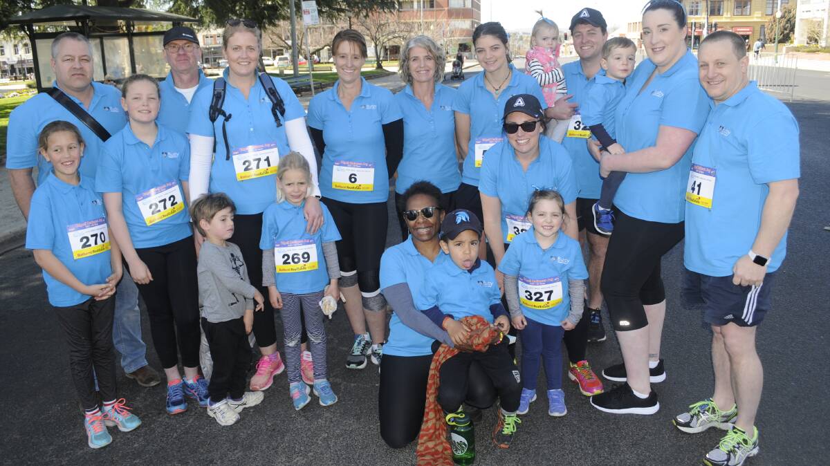 READY TO RUN: The Busby Medical Practice team before the jog. Photo:CHRIS SEABROOK 091717cejog2
