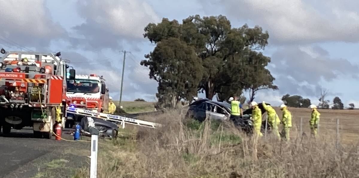 Emergency services at the scene of the single vehicle roll over.
