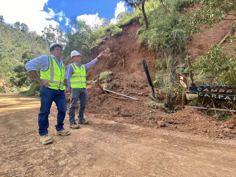 DAMAGED: Member for Bathurst Paul Toole, left, with Transport for NSW Western Region Pavements and Geotechnical manager Iain McLean.