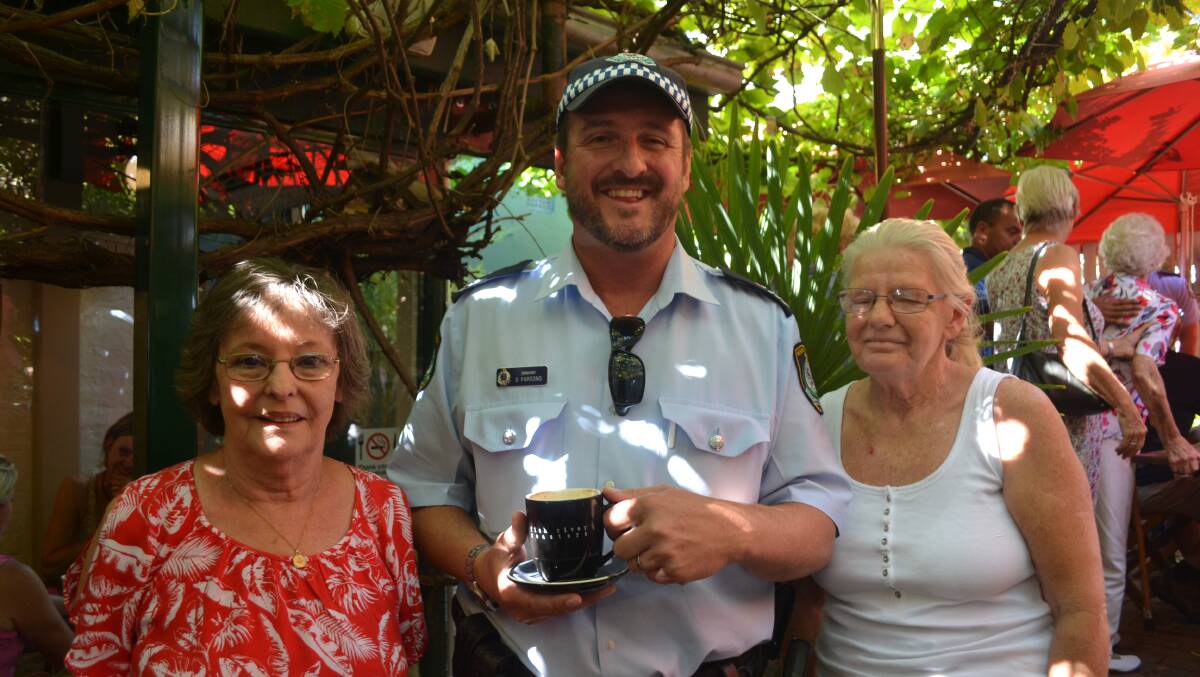 COMMUNITY EVENT: Trish Wilde, Sergeant Dave Parsons and Mim Burton at the Coffee with a Cop.