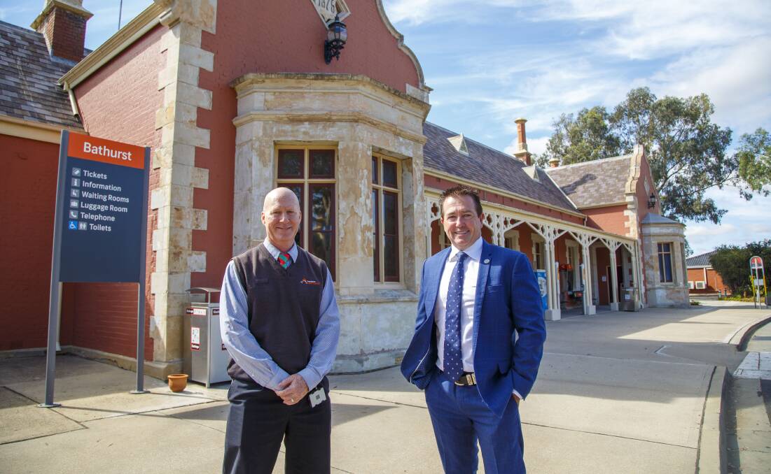 FUNDING: NSW Trains Senior Customer Attendant Andrew Butler with Member for Bathurst Paul Toole in front of Bathurst Railway Station. 