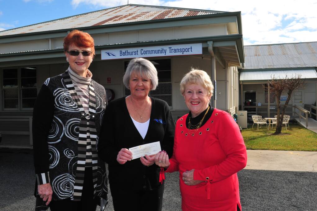 COMMUNITY SUPPORT: Marion Pearce, Leonie Schumacher (Bathurst Community Transport) and Elaine Egan, handing over a cheque for $3,000.