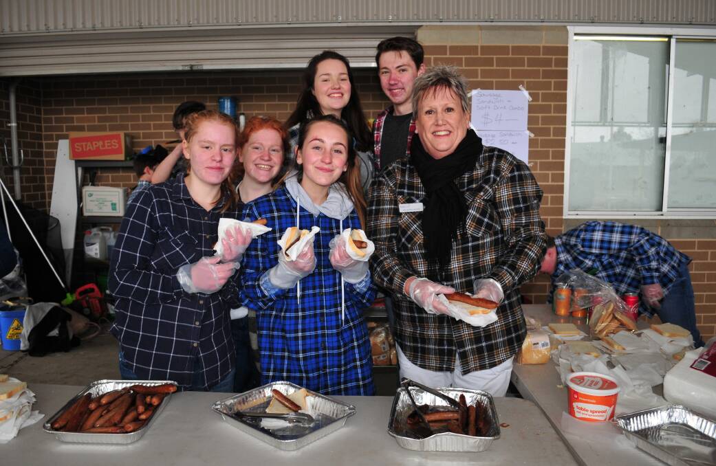 HELPING HAND FOR FRAMERS: Students from Kelso High School's SRC, Josie and Madeline Geerkens, with Alivia Bourke, Akira Berrisford and  Isaac Connor with Councillor Jacqui Rudge at the school's fundraiser.