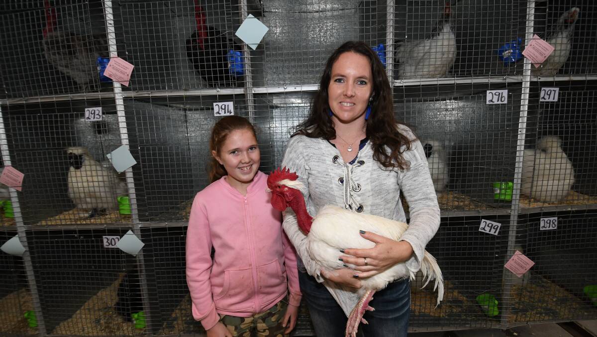 COMPETITION: Belle and Melissa Cosgrove (from Rockley) with her Naked Neck Large Fowl. 061018cpoultry3
