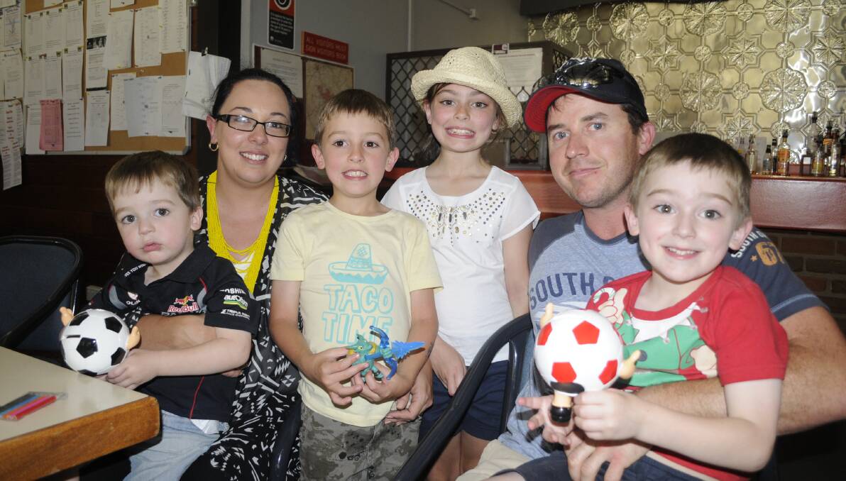 FAMILY DAY OUT: Melissa and Shane O'Brien with their kids from left, Joseph, Aiden, Elizabeth and William at the Majellan Bowling Club. 112716cxmasapp4