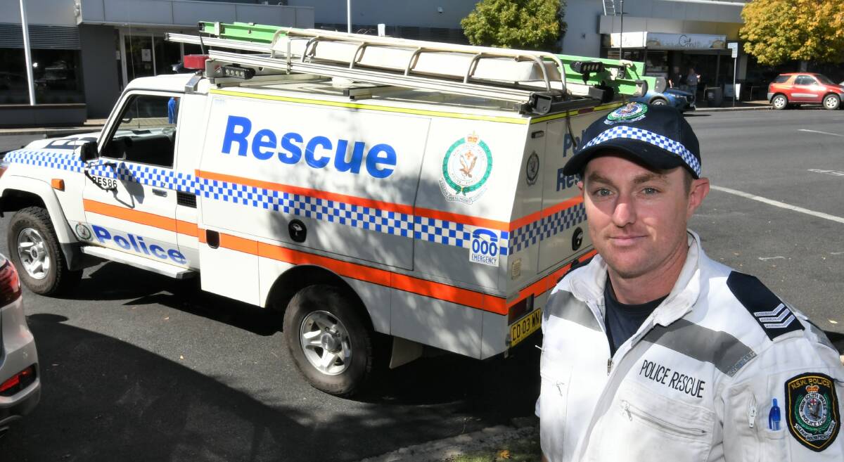 EXPANDED RESPONSE: Acting Sergeant Daniel Fitzpatrick with the NSW Police Rescue vehicle outside Bathurst police station. Photo: CHRIS SEABROOK 031521ccopshop3