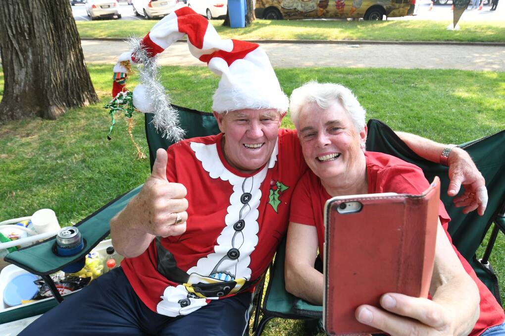 GREAT NIGHT: Des and Susie Green, pictured in Machattie Park, at their 25th Carols by Candlelight. Photo: CHRIS SEABROOK