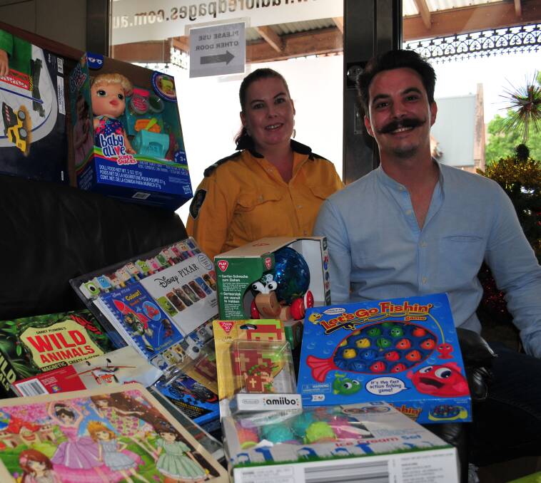 RFS DONATION: Skye Dawes from the Raglan RFS with Alexis Le Masson, digital content manager for 2BS.