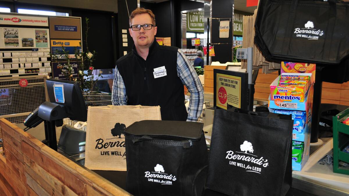 STEP IN THE RIGHT DIRECTION: Bernardi's IGA checkout manager David Jackson with the reusable bags.