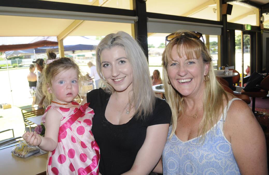 FUN FAMILY DAY: Charlotte Fleischmann with her mum, Jemma Plunkett and Bronwyn Davey. 112716cxmasapp7