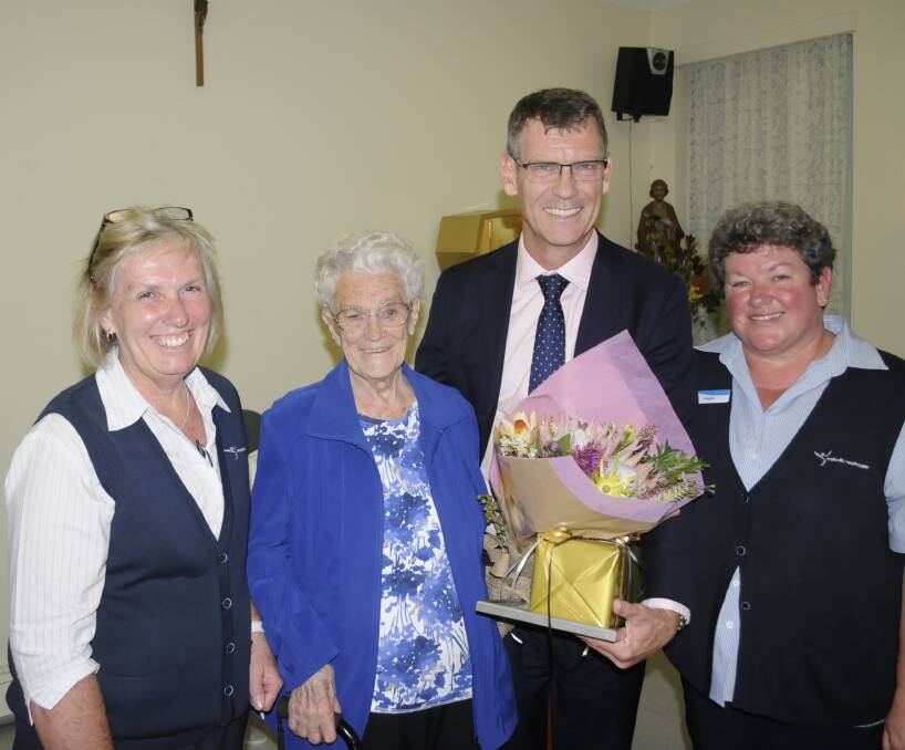 WELL DONE: Left, Elizabeth Zachulski (St.Catherine's Aged Care), Betty Burke (40 years service to the auxilary), David Maher (Managing Director, Catholic Healthcare) and Angela Stocks (St Catherine's). Photo:CHRIS SEABROOK 103116cbetty