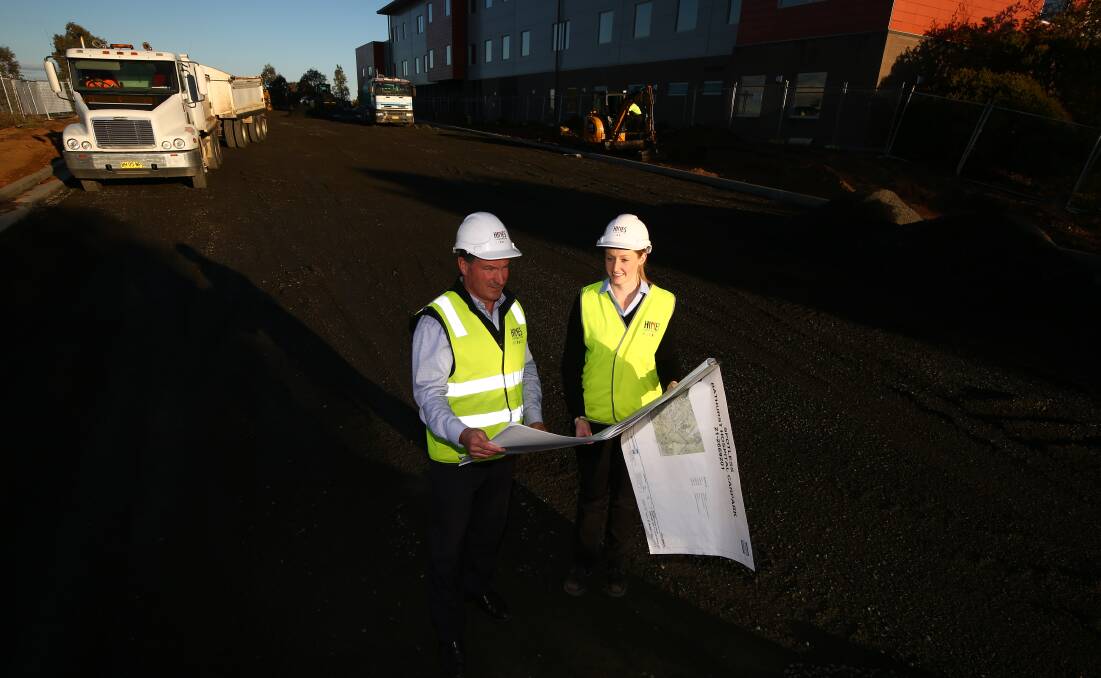 ON TRACK: Hines Constructions David Hines and project manager Lindsi Frisby at new carpark site at Bathurst Hospital.
