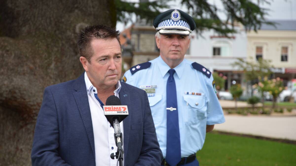 CRACKDOWN: Member for Bathurst, Paul Toole, with Supt Peter O'Brien, in Machattie Park on Thursday.
