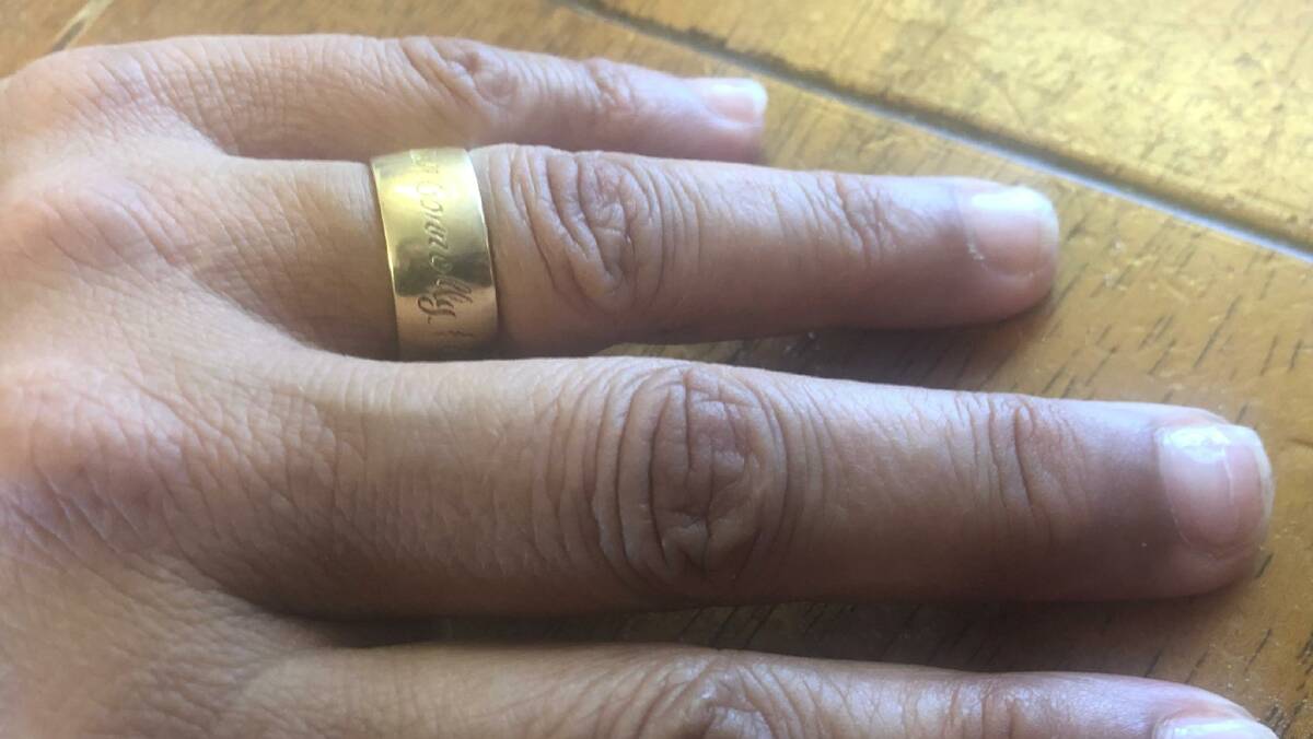 The wedding band is band on Dionne Connolly's hand.