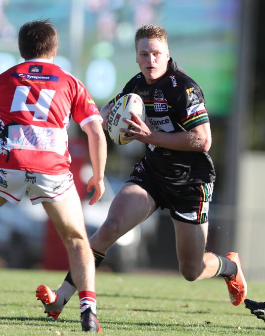 CHARGE: Jack Siejka takes a run at the Mudgee Dragons line. Photo: PHIL BLATCH