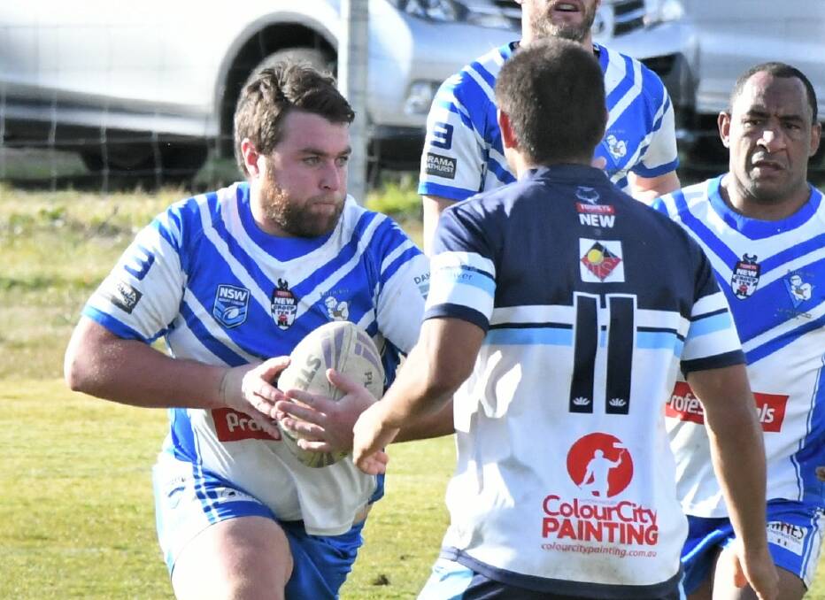 SLOW AFFAIR: Jack Mackey and St Pat's never really got their game going in a 30-8 Group 10 premier league loss to Mudgee Dragons on Saturday, played in boggy conditions. Photo: CHRIS SEABROOK