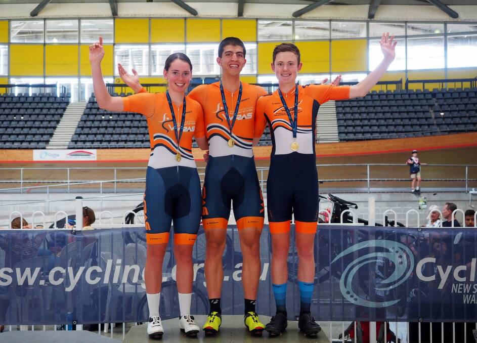 ON THE TOP STEP: Bathurst Cycling Club members Kalinda Robinson, Dan Googe and Luke Tuckwell celebrate their JM19 Team Sprint gold medal. The club finished with four golds. Photo: CONTRIBUTED
