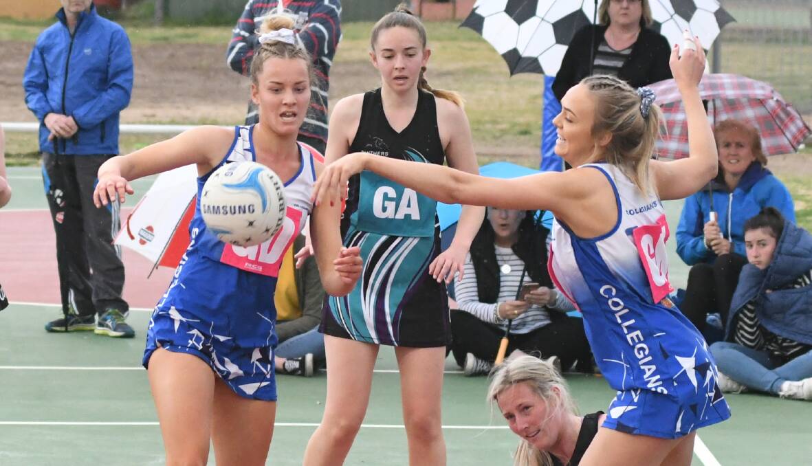 PARTNERS IN CRIME: Collegians goal defence Teagan Germech (left) was named player of the grand final. Her and goal keeper Sam Thompson (right) proved hard for the Panthers attack to get through. Photo: CHRIS SEABROOK