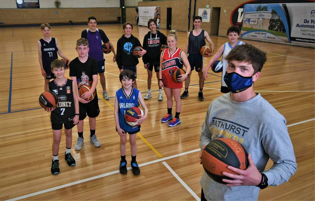 OPEN: Bathurst Indoor Sports Stadium manager Andrew James with players enjoying the chance to use the courts on Wednesday afternoon. Photo: CHRIS SEABROOK
