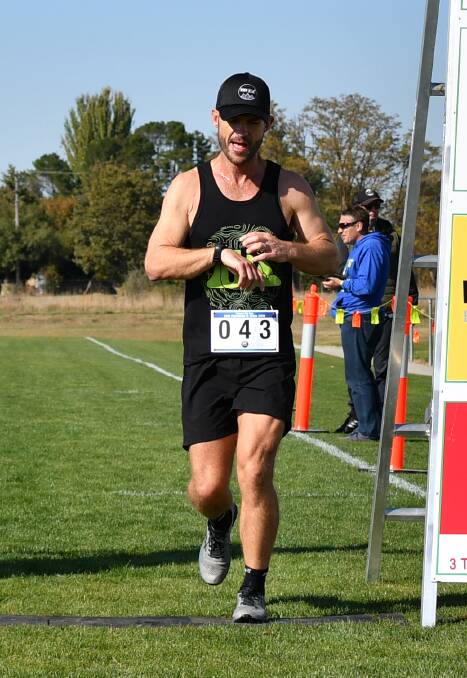 SILVER: Wes Gibson crossing the line in the Bathurst Half Marathon earlier this year. Photo: ALEXANDER GRANT