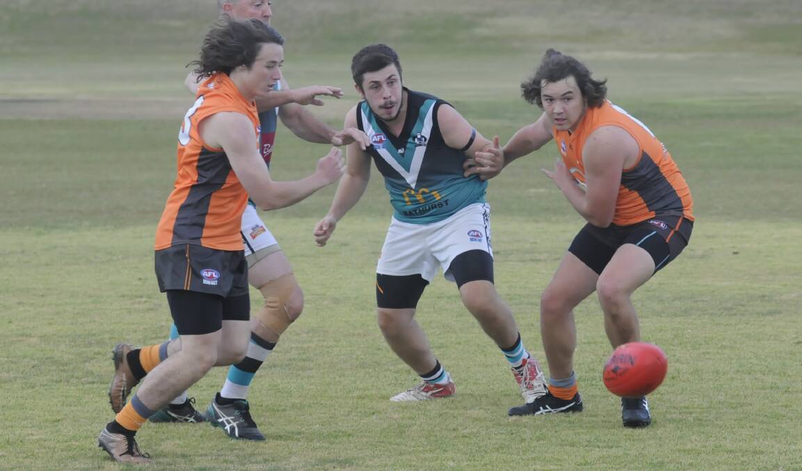 GIVE IT A SHOT: The Central West AFL season may be done and dusted but Bathurst players can still get their Australian rules fix this summer with the AFL9s competition, which starts this Friday. Photo: CHRIS SEABROOK