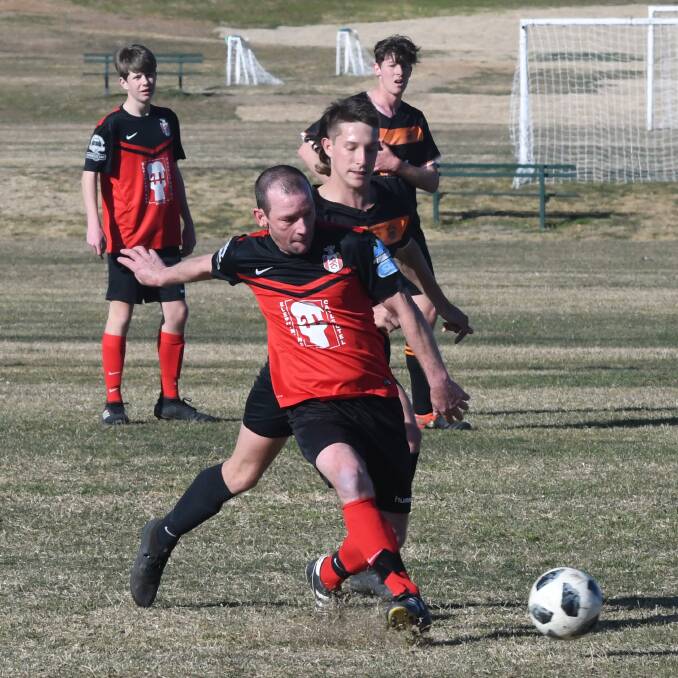 GOATS ON TOP: Tony Clancy and Panorama FC Red were 3-2 winners in an entertaining game over Macquarie United. Photo: CHRIS SEABROOK 072218csocr2