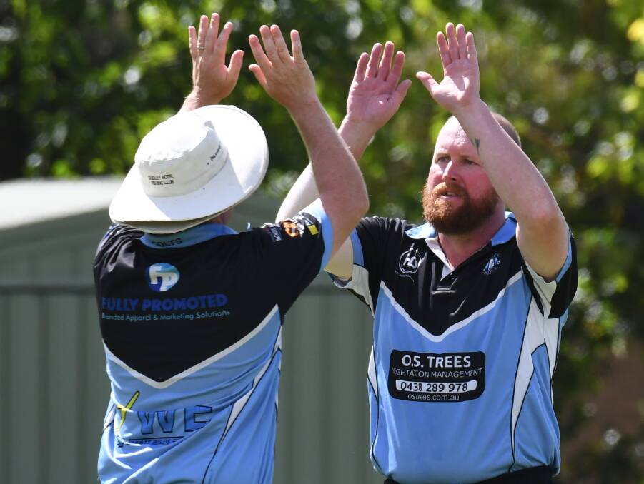 ONE DAY MORE: Dave Henderson celebrates one of his five wickets for City Colts in Saturday win over defending champions Orange City. Photo: JUDE KEOGH