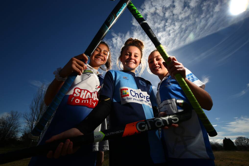 TERRIFIC TRIO: Macey Fulton, Charlize Fitzpatrick and Lily Kable will play for the NSW Under 13s representative team at October's National Championships. Fitzpatrick has made the final cut in her second attempt while Fulton and Kable made the team as bottom age players. Photo: PHIL BLATCH