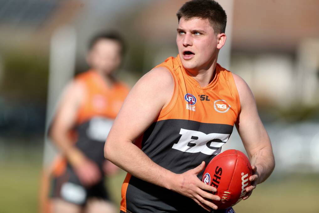 INTO THE MIX: Jacob Schneider impressed for the Giants in his first senior game. Photo: PHIL BLATCH