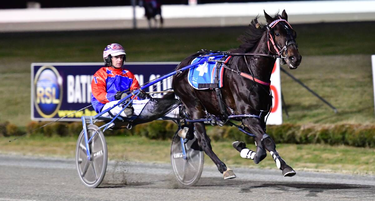 A CUT ABOVE: Mat Rue and Don Arthur skip away to an easy victory in the opening race of Wednesday night's Bathurst Paceway meeting. Photo: ALEXANDER GRANT