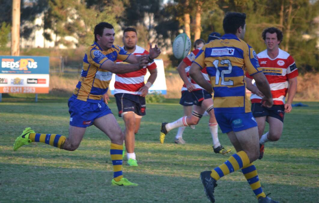 ANOTHER WIN: Scott Johnston sends the ball across the Bathurst Bulldogs' line in his side's 31-0 success over hosts Cowra Eagles on Saturday. Both Johnston and Adam Geal scored two tries in the win.