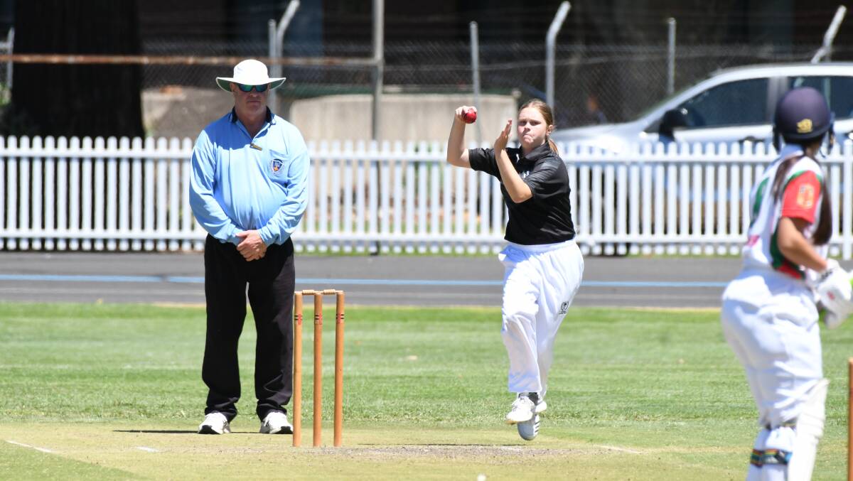 READY TO BOWL: Riverina's Perri Nash in action against Western. Photo: CHRIS SEABROOK