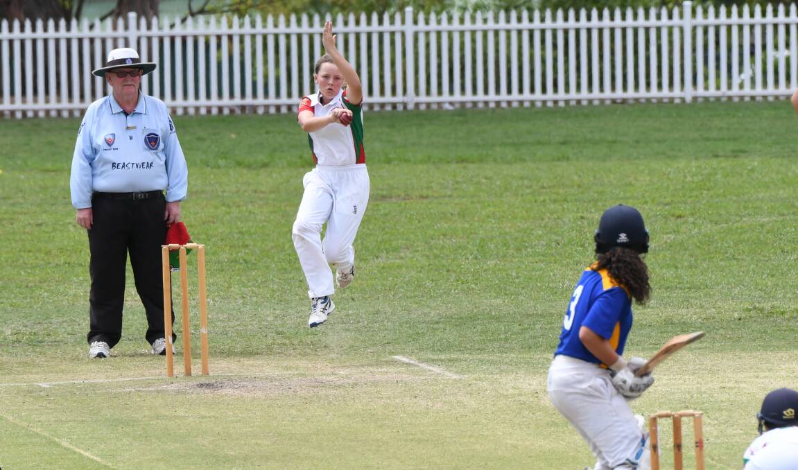 DELIVERY INBOUND: Western's Maddy Spence charges in to bowl at a Hunter opponent during Tuesday's game at Watson Oval. Western finished the day with one win and one loss, just as they did on Monday. Photo: CHRIS SEABROOK