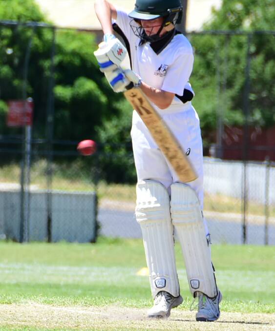 BLOCK: Ethan Muller plays back foot defence for the Mitchell Cricket Council's under 16s side during last Sunday's game against Lachlan. Photo: ANDREW FISHER