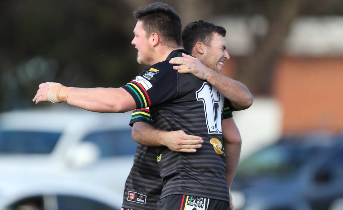 YOU RIPPER: Josh Small (left) celebrates after scoring in last Sunday's win over CYMS. Photo: PHIL BLATCH