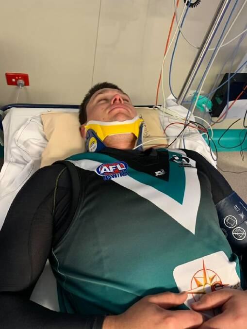 SCARE: Adam Ryan's suspected neck injury brought the Bathurst Bushrangers Rebels and Orange Tigers game to an end but the Rebels player was cleared of any injury.