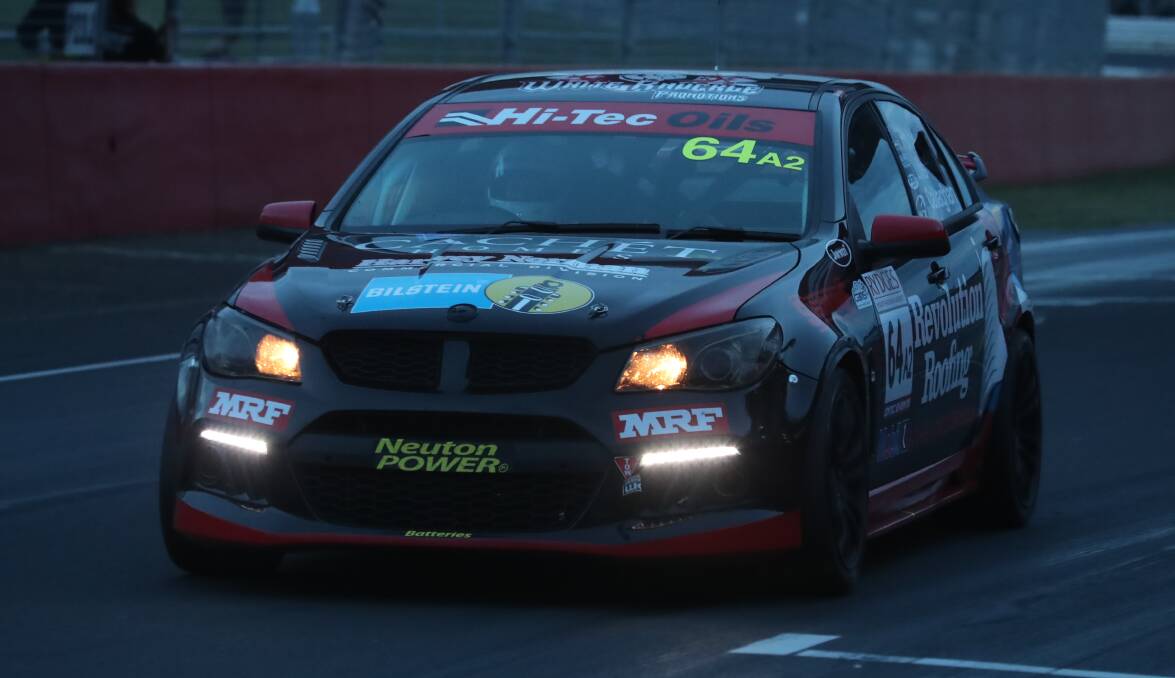 COMMODORE CRUISES HOME: Chris Lillis, Nathan Callaghan and Matthew Holt picked up a surprise third place in Sunday's Bathurst 6 Hour. Photo: PHIL BLATCH