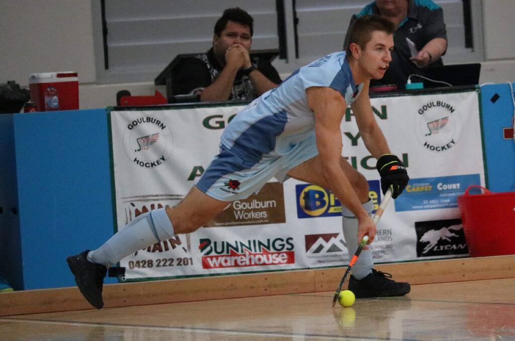 SCANNING: Lachlan Howard looks for options during his Under 15 Australian Indoor Hockey Championships campaign for NSW. Photo: CONTRIBUTED