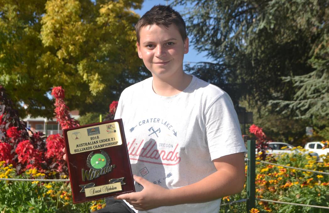 TOP EFFORT: Denzel Nicholson, 14, has become the youngest winner of the Australian Under 21s Billiards Championship. Photo: ALEXANDER GRANT