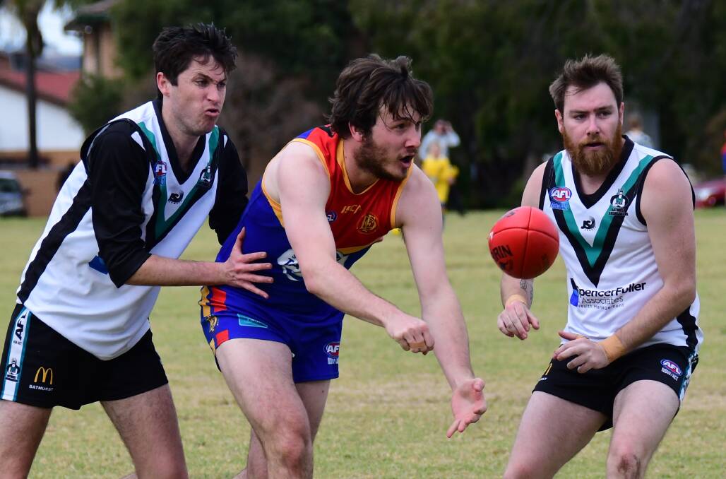 FLIP IT: Bushrangers' previous game against the Demons (pictured) didn't go to plan. Photo: AMY MCINTYRE