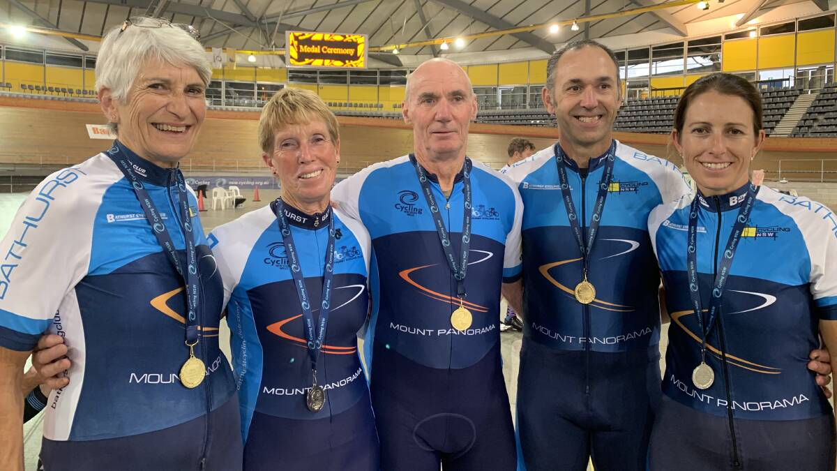 GOLDEN RIDERS: Rosemary Hastings, Marian Renshaw, Graham Stait, Charlie Gascoyne and Toireasa Gallagher stand proudly with their medals at Dunc Gray Velodrome during the NSW Masters Track Championships. Photo: CONTRIBUTED