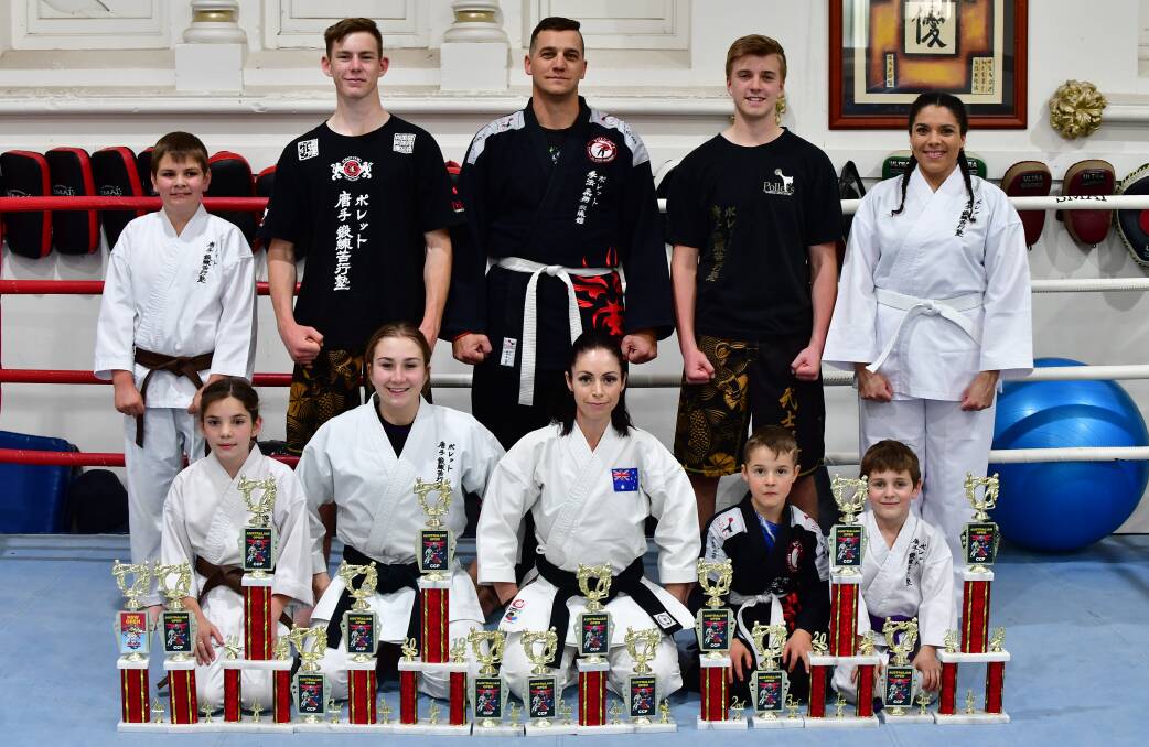 TALENT IN SPADES: Pollet's Martial Arts members with their trophies from the recent CCP event. Photo: ALEXANDER GRANT