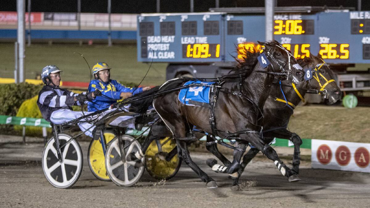 NOTHING IN IT: Todd McCarthy and Tiger Tara (closest to camera) narrowly hold out Anthony Frisby and Our Uncle Sam during Saturday night's Inter Dominion heat. Photo: ASHLEA BRENNAN