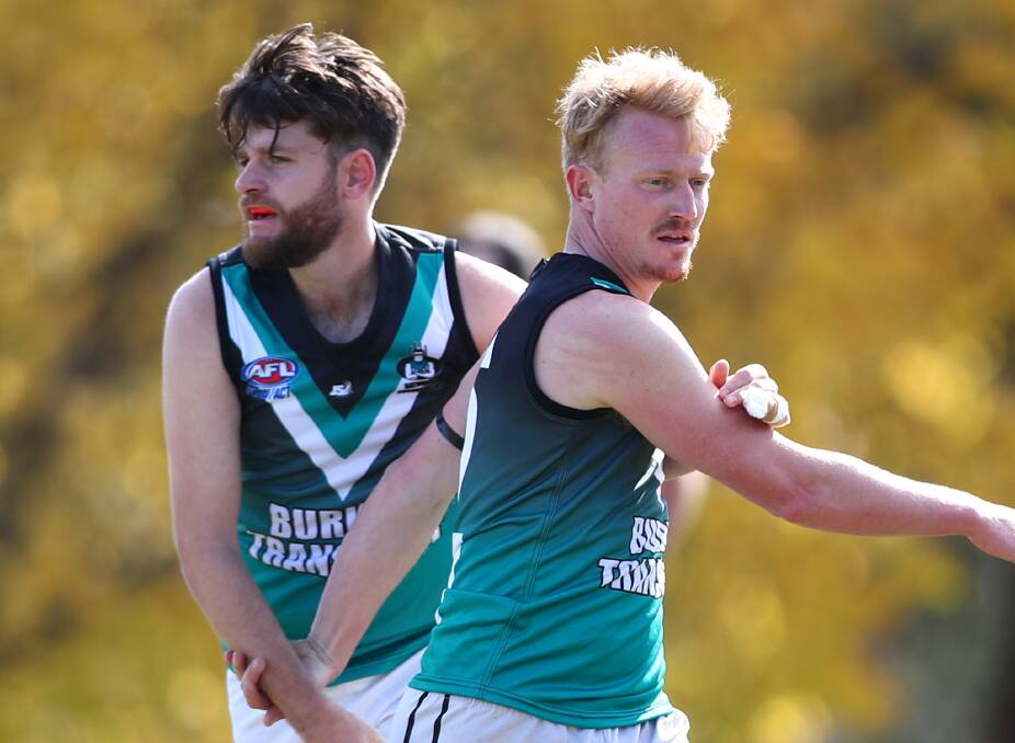 BACK TRAINING: Bathurst Bushrangers senior first grade co-coach Tim Hunter (left, pictured with Peter Grundy) has enjoyed the early stages of the return to training.